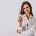 female-dentist-with-dentistry-tools-isolated-min